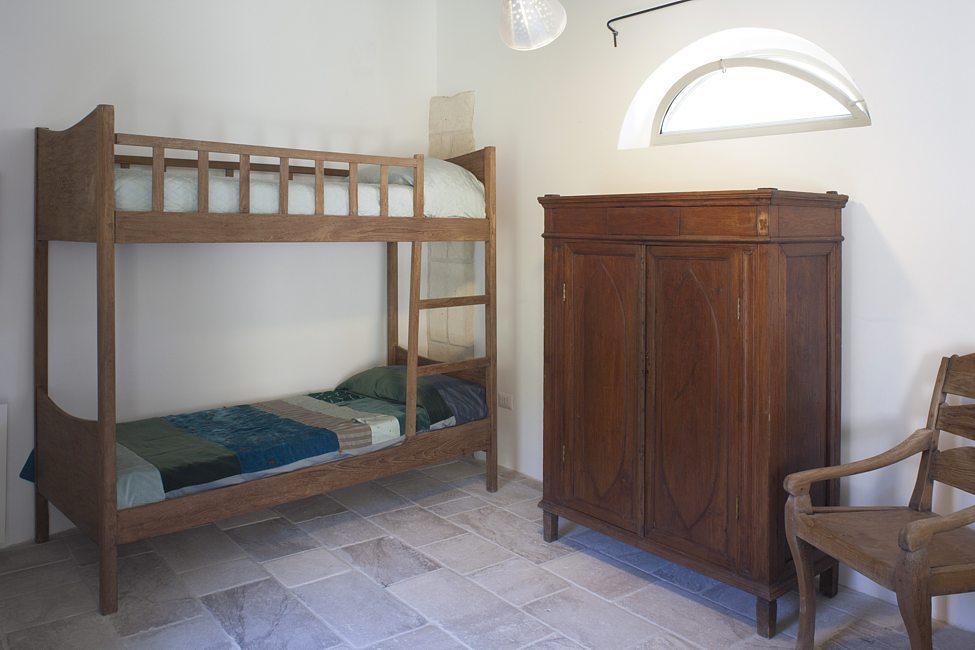 Nucleo A con accesso dal giardino - Camera da letto con letto a castello