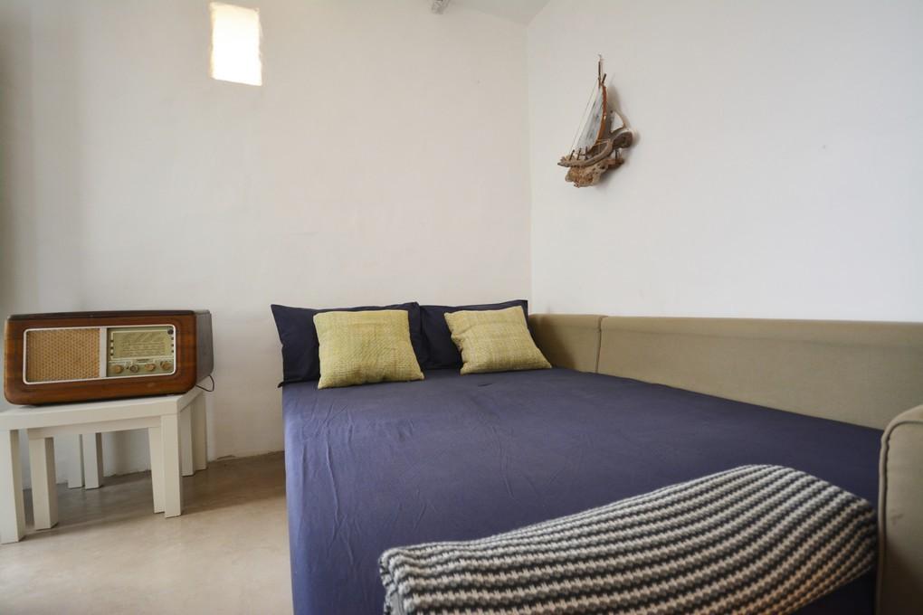 Camera da letto matrimoniale con divano letto