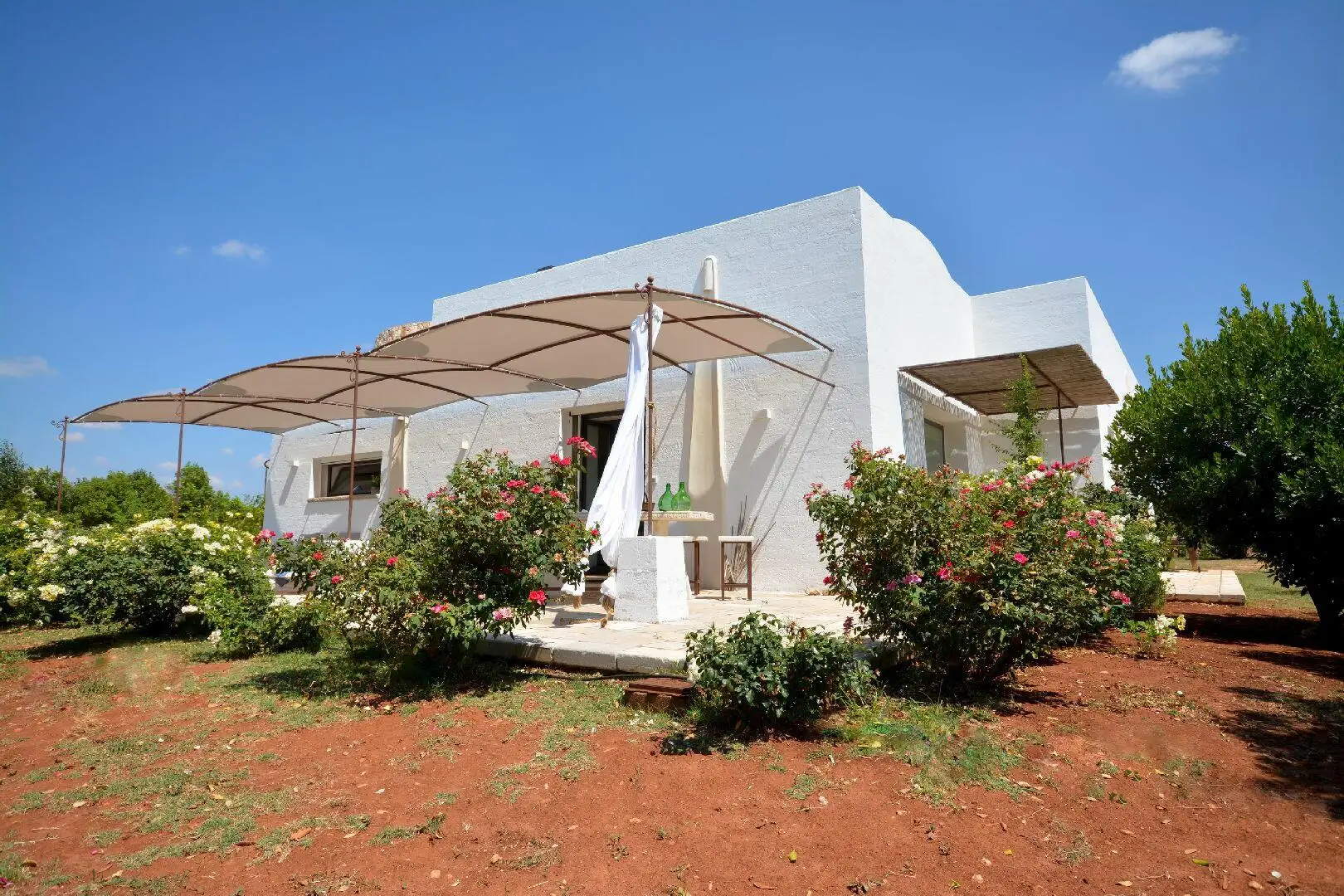 Façade avec véranda donnant sur la mer