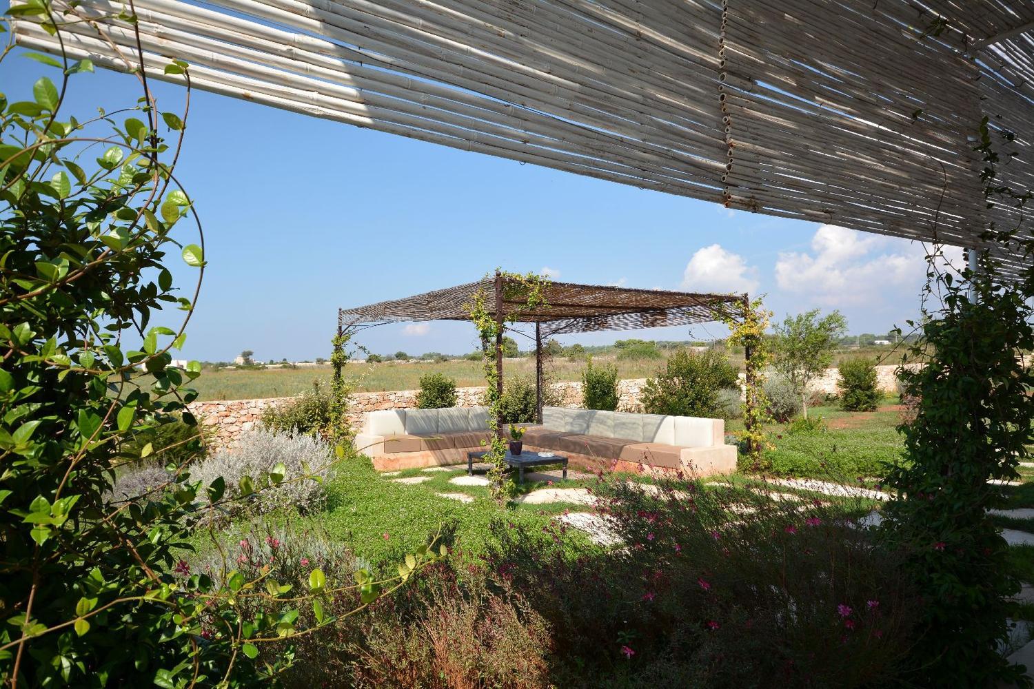 Pergola with sofas and sea view