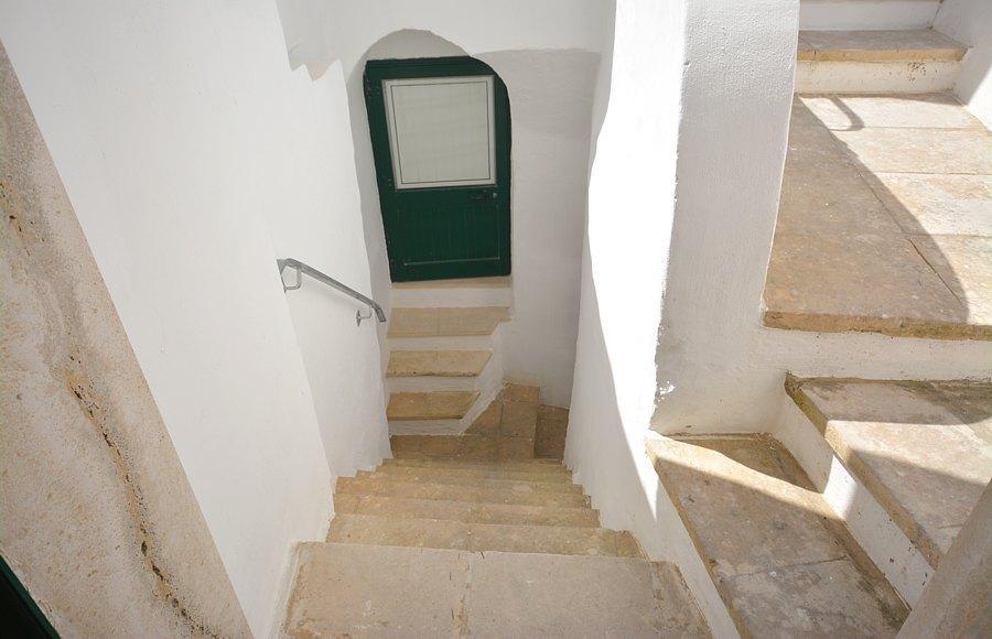 Stone stairs leading to the common terrace