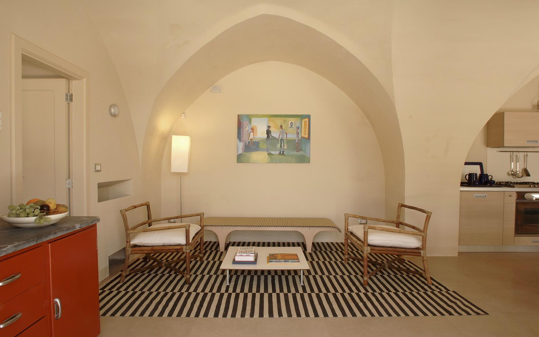 Guest house A - Suite quattro Vele - espace avec salon, salle à manger et coin cuisine