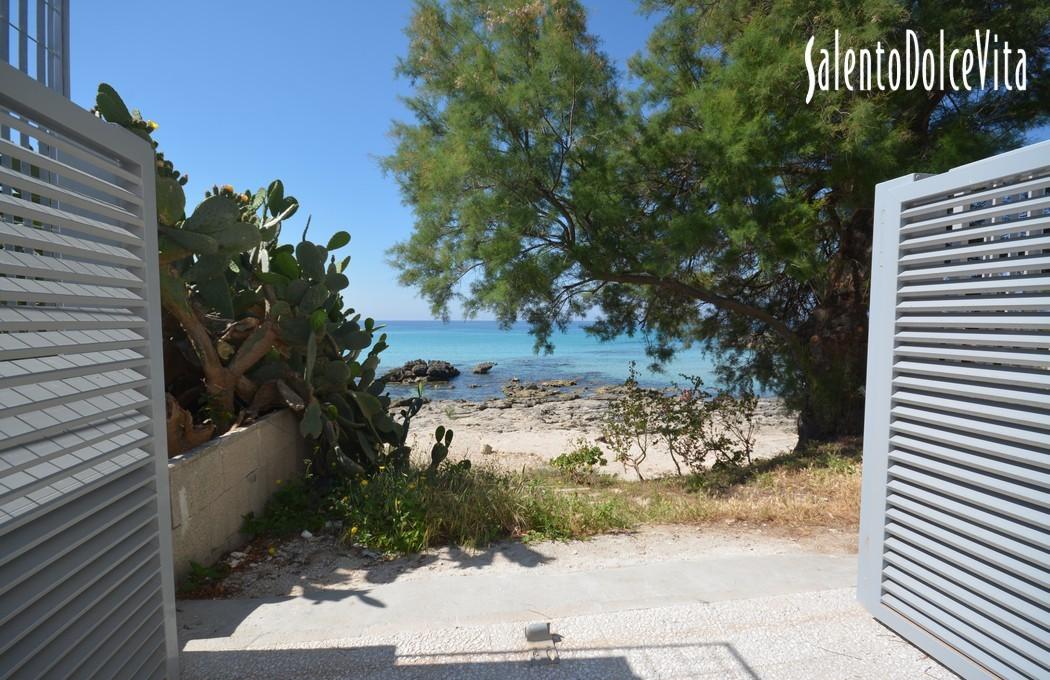 Private passageway with gate to the sea