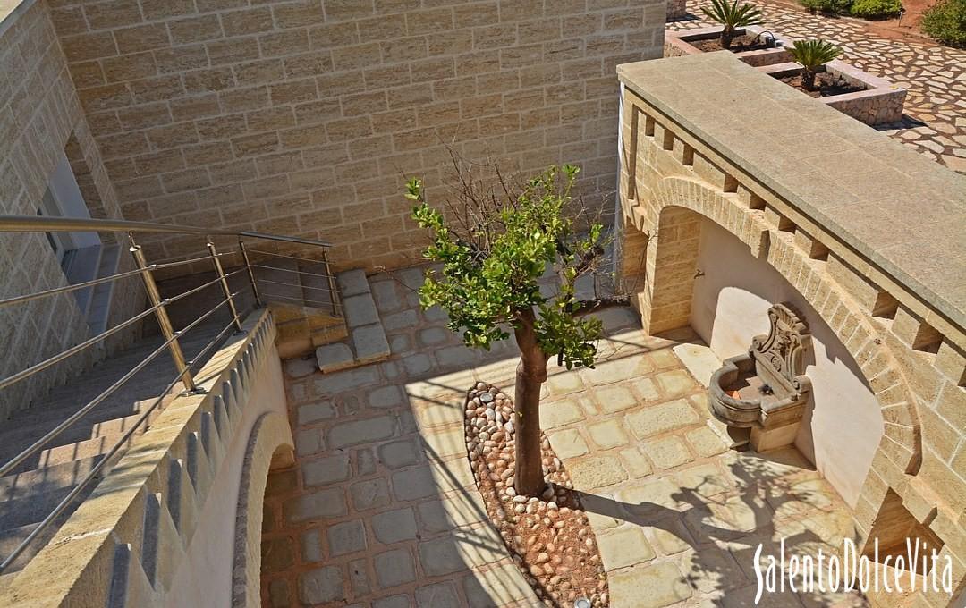 Small courtyard with stairs leading to the roof top terrace