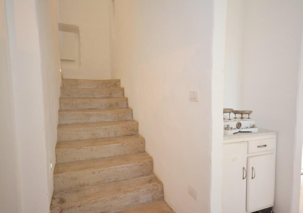 Stairs leading to the first floor