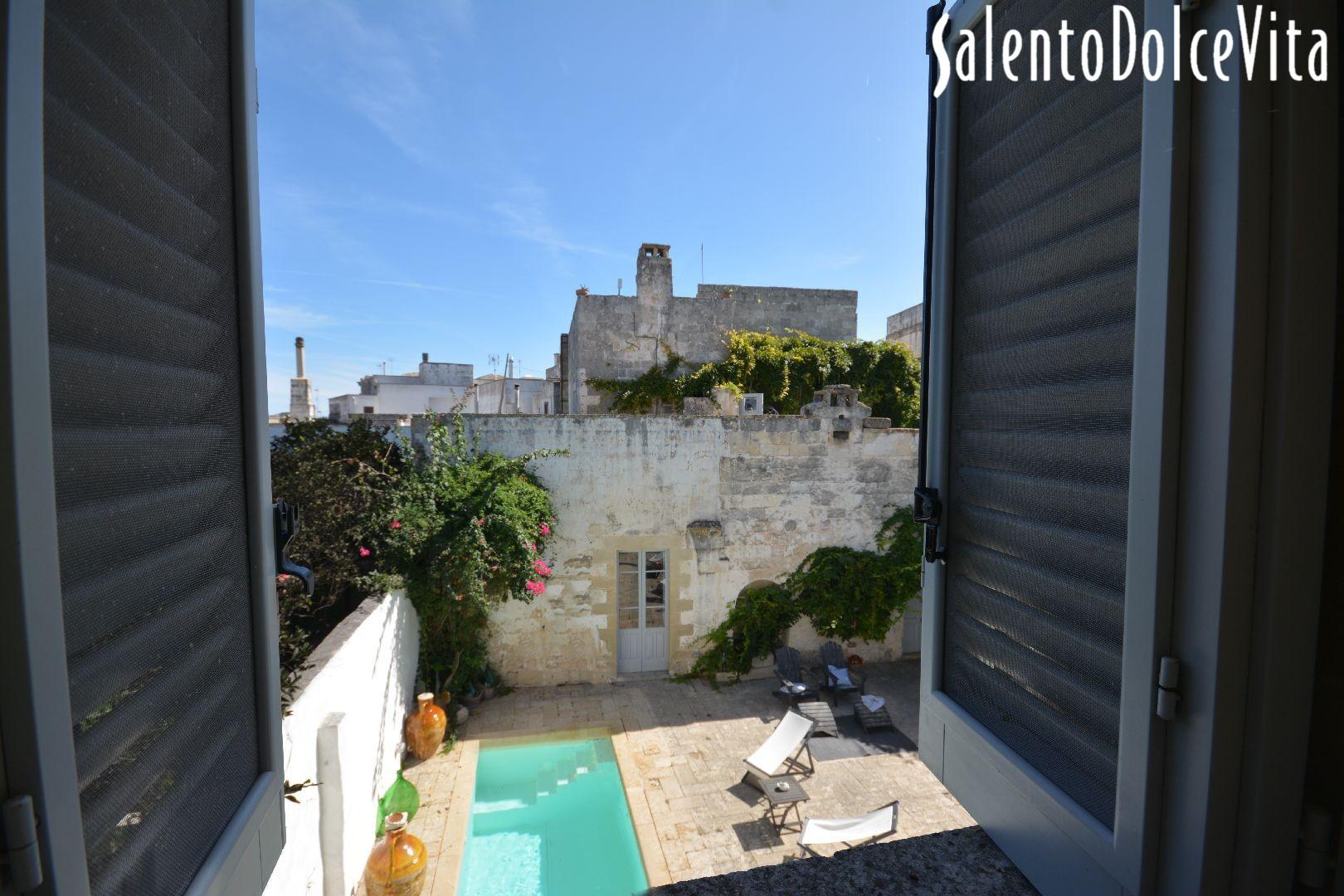 First floor double bedroom A swimming pool view