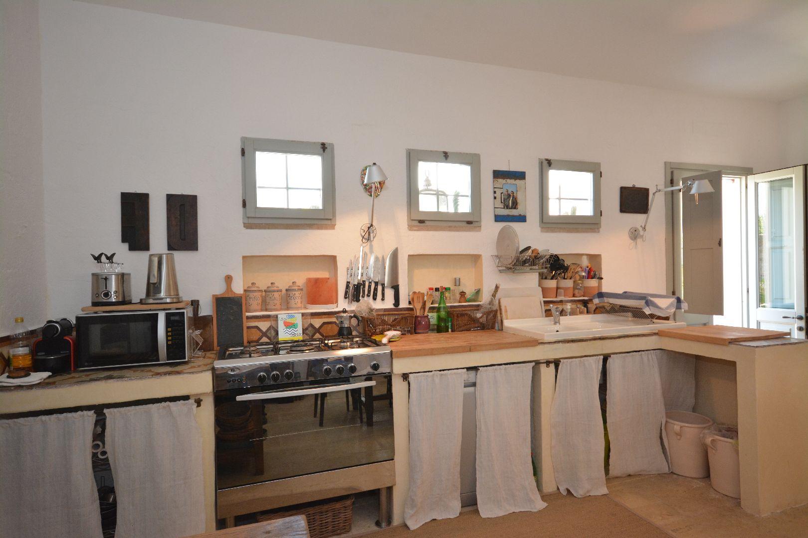 Main house, ground floor dining room with Kitchen area 