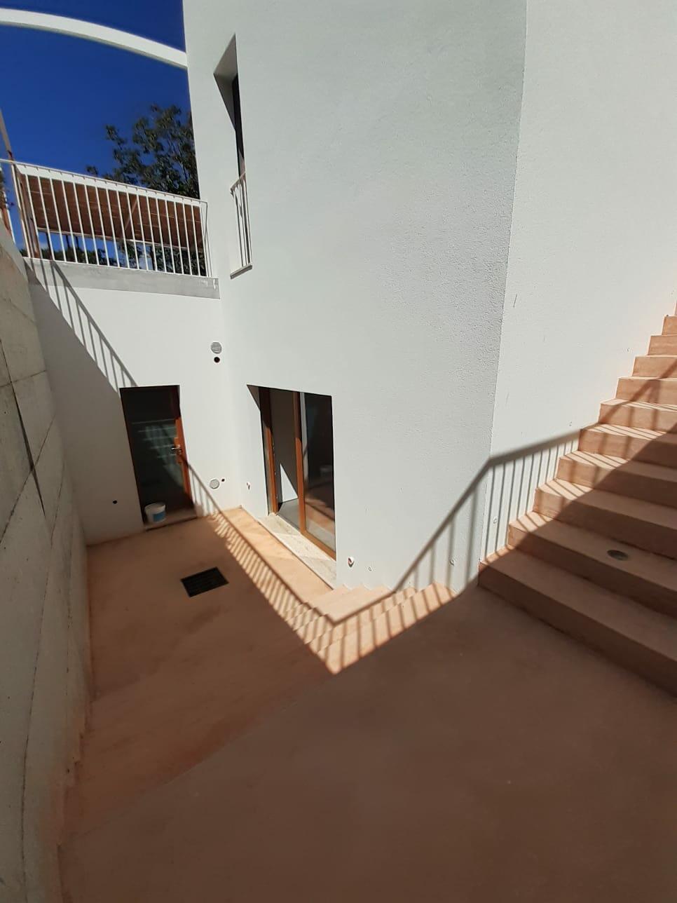 outdoor Staircase to basement & Double bedroom D