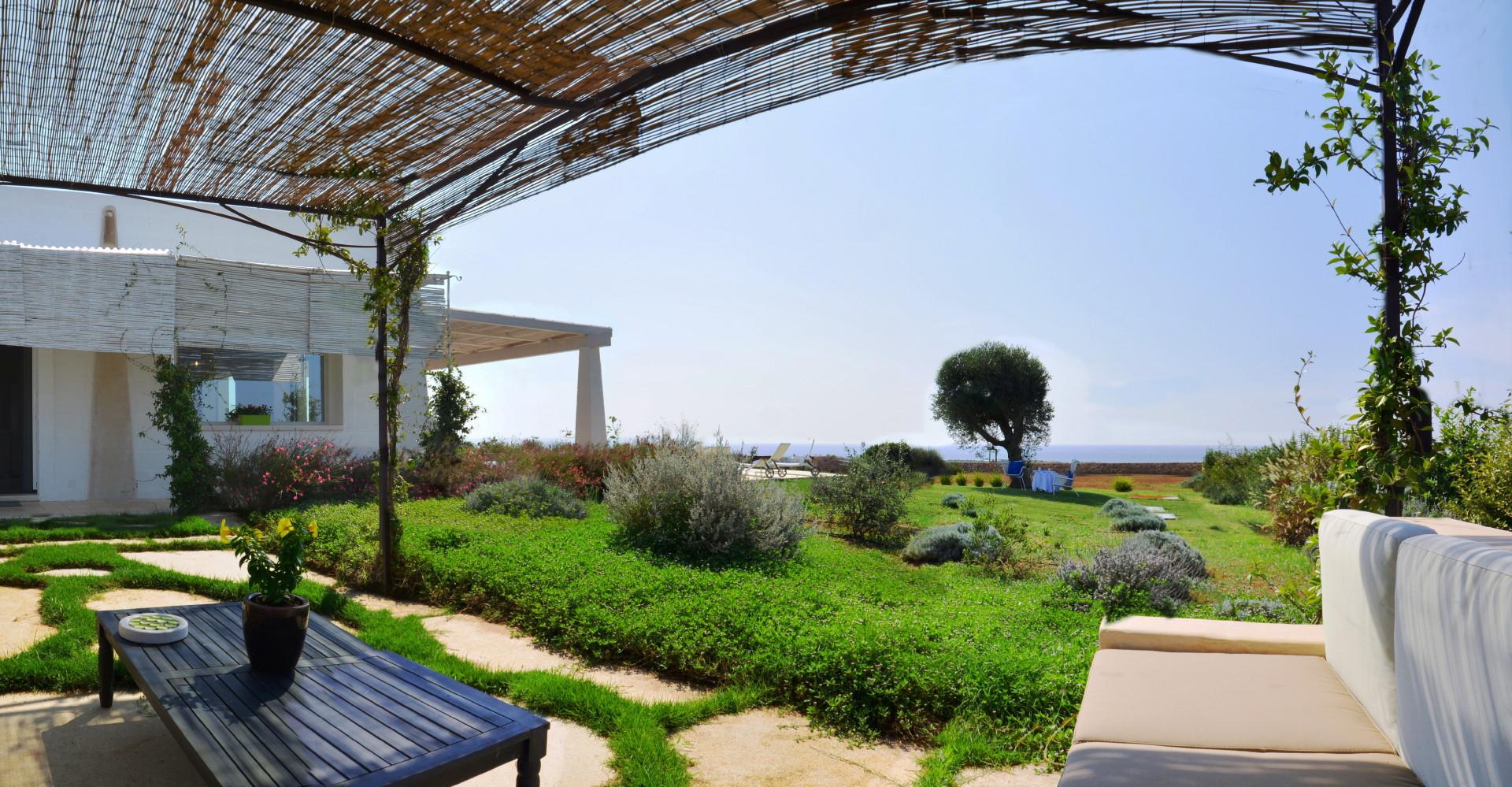 Pergola with sofas and sea view