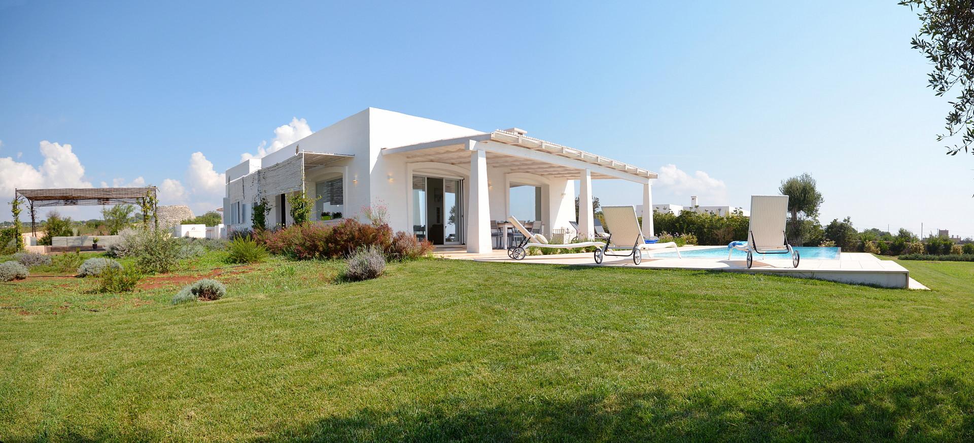 The villa- the pool the garden and the sea view