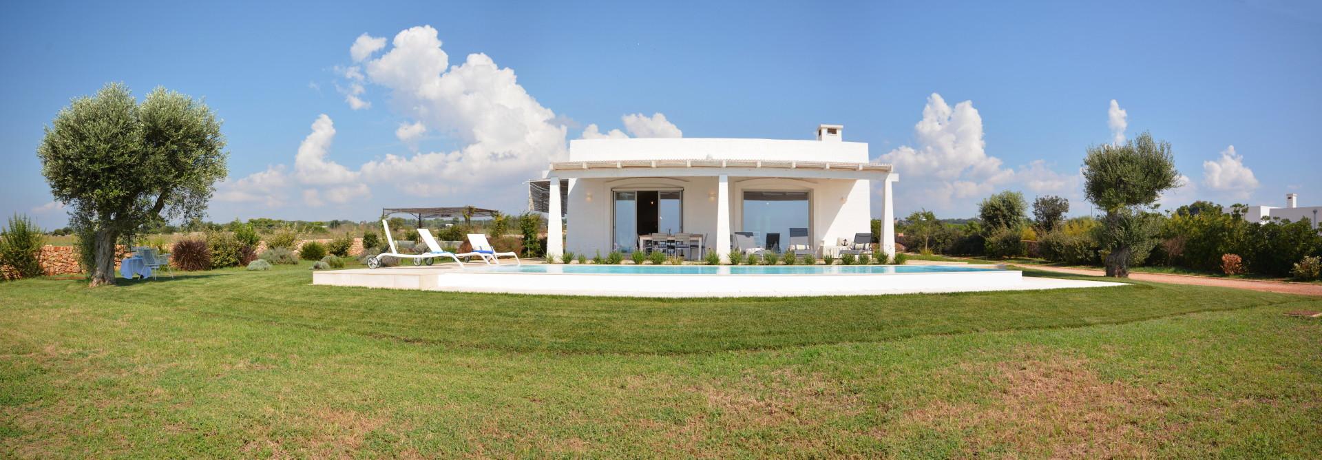 The villa- the pool the garden and the sea view