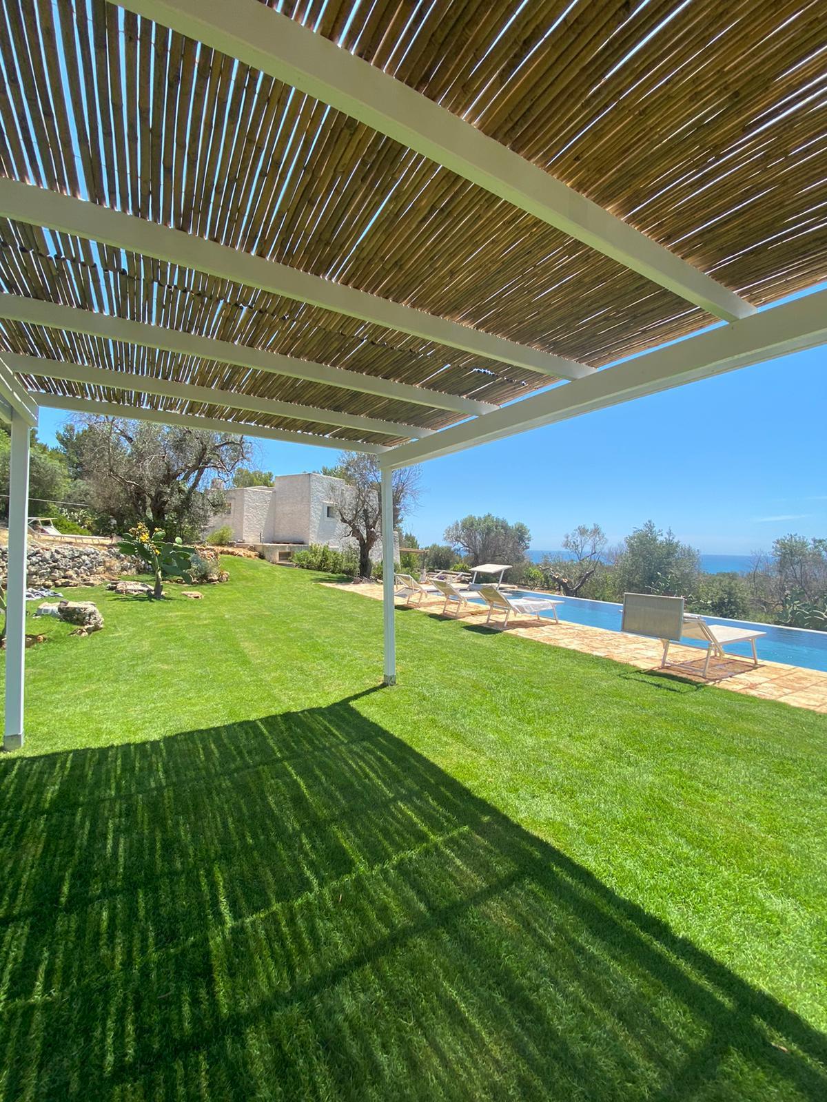 Swimming pool area with sea view