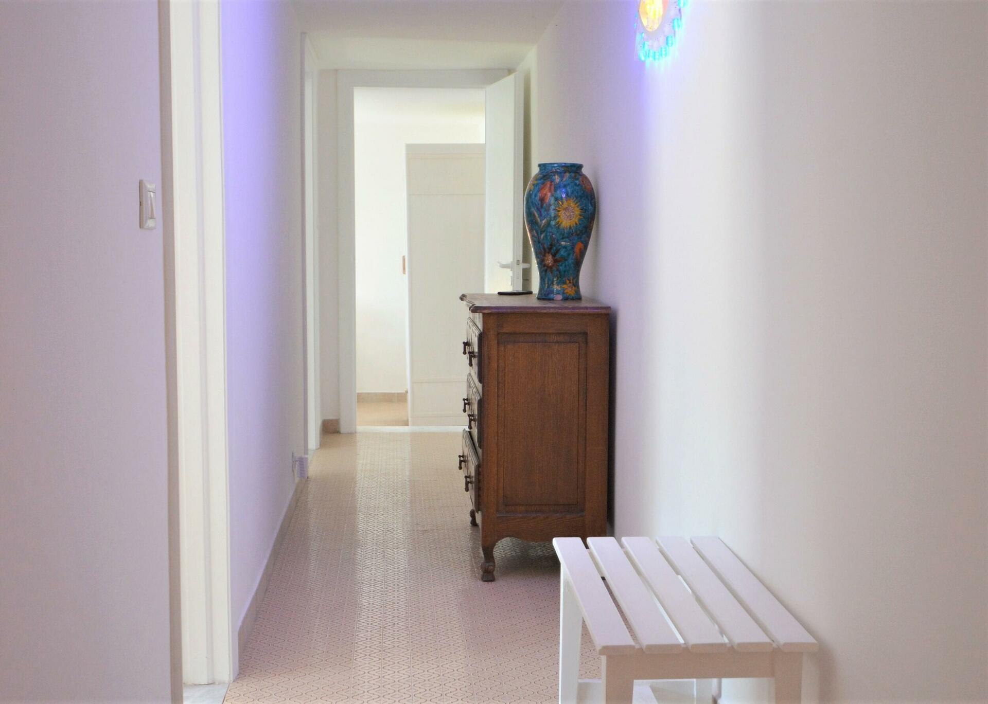 Hallway connecting the 3 bedrooms