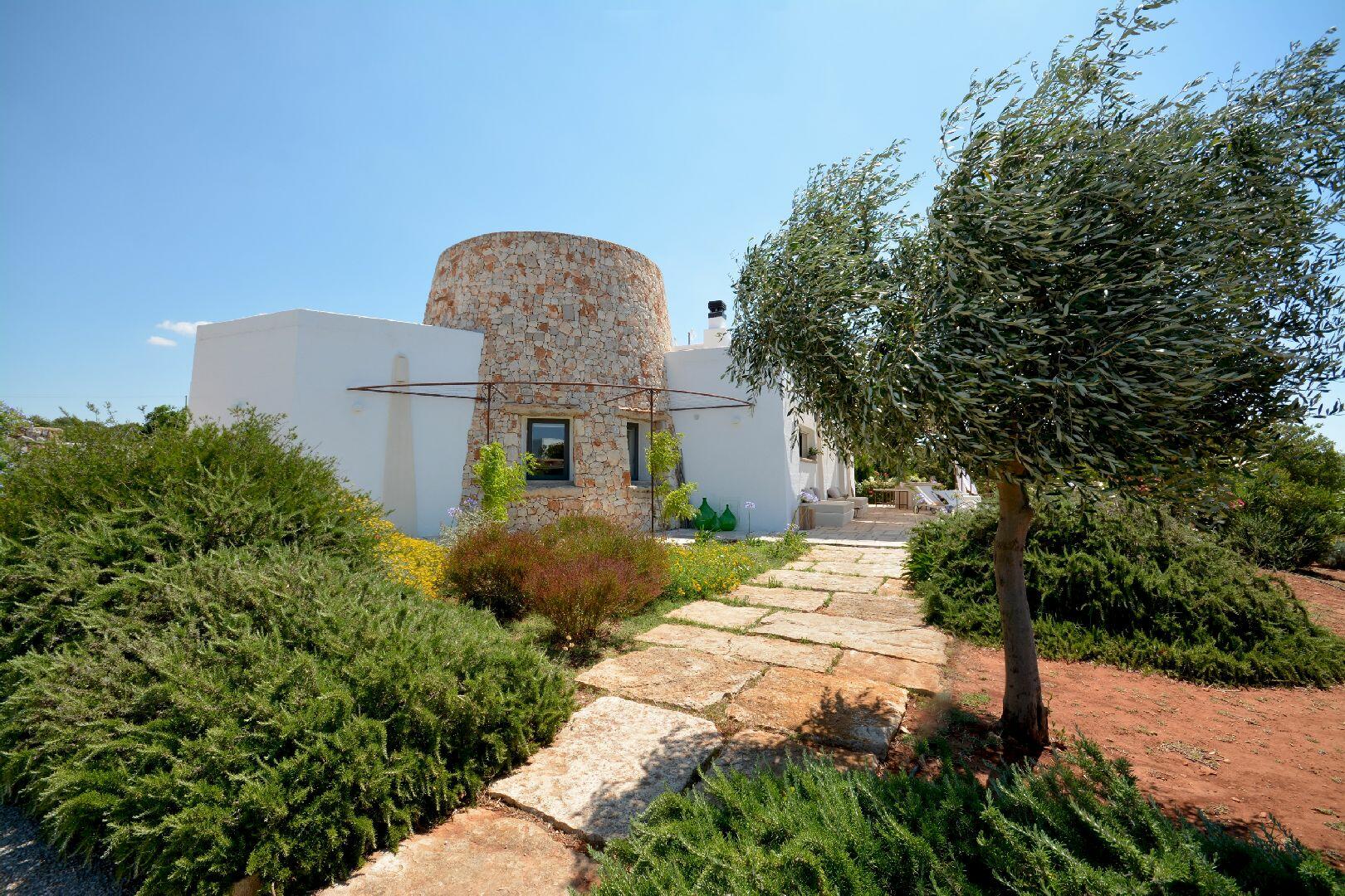 Façade avec véranda donnant sur la mer