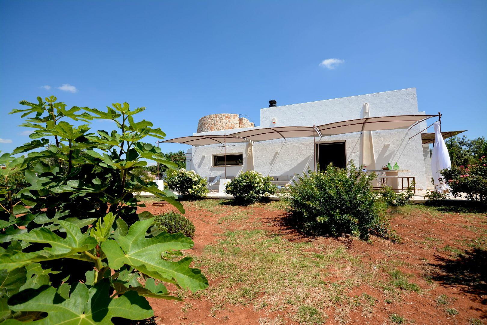 Façade avec véranda donnant sur la mer